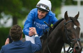 William Buick celebrates after riding Ruling Court to win the Betfred 2000 Guineas.