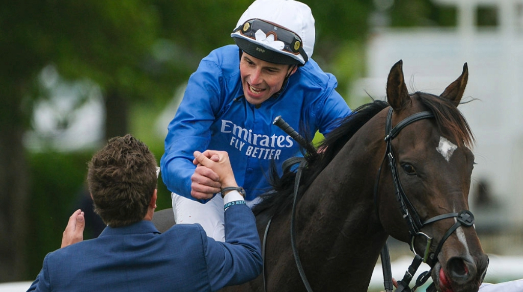 William Buick celebrates after riding Ruling Court to win the Betfred 2000 Guineas.