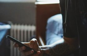 A Man Holding a Smartphone