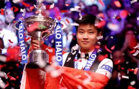 Zhao Xintong of China Poses with His 2025 World Snooker Championship Trophy