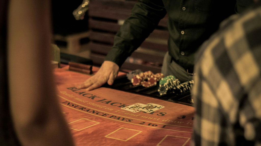 Blackjack Game Being Played at a Casino