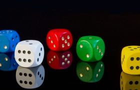 Gambling Dice on Black Font