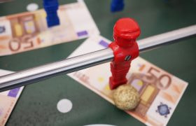 Banknotes on a Foosball Playfield