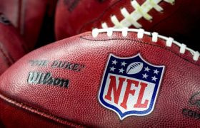 A selection of NFL branded balls.