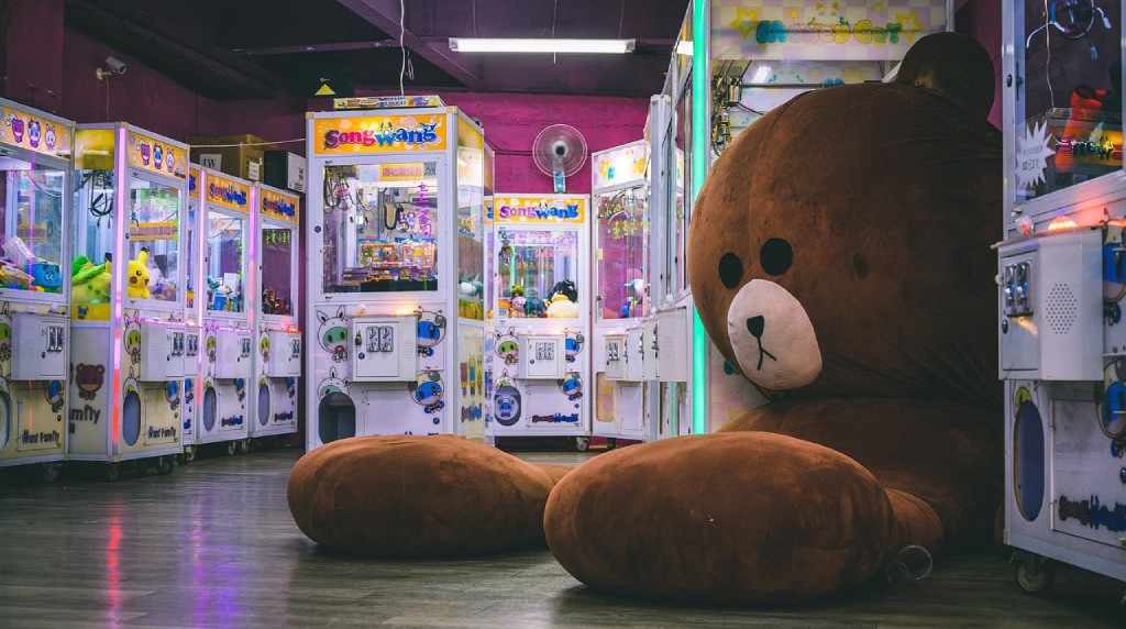 Arcadae Game Machines and a Giant Teddy Bear