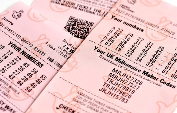 A UK Lotto Ticket with Its Numbers on Display.