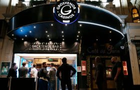 Punters Line Up Outside The Rialto Casino in London.