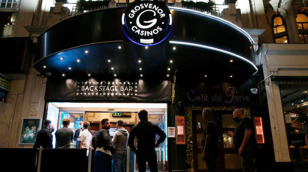 Punters Line Up Outside The Rialto Casino in London.