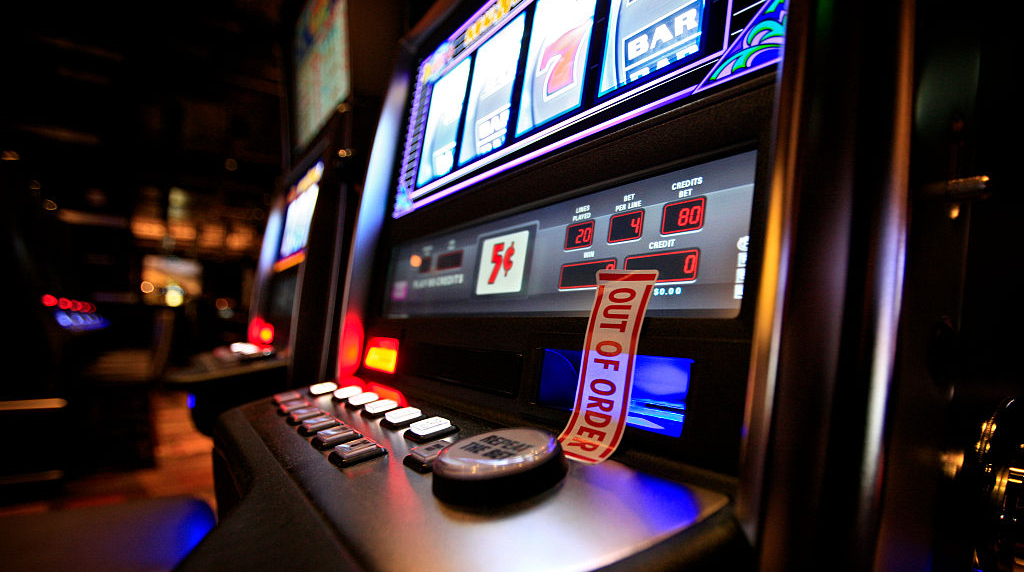 A Slot Machine with ‘Out of Order’ Tape Over Its Cash Slot.