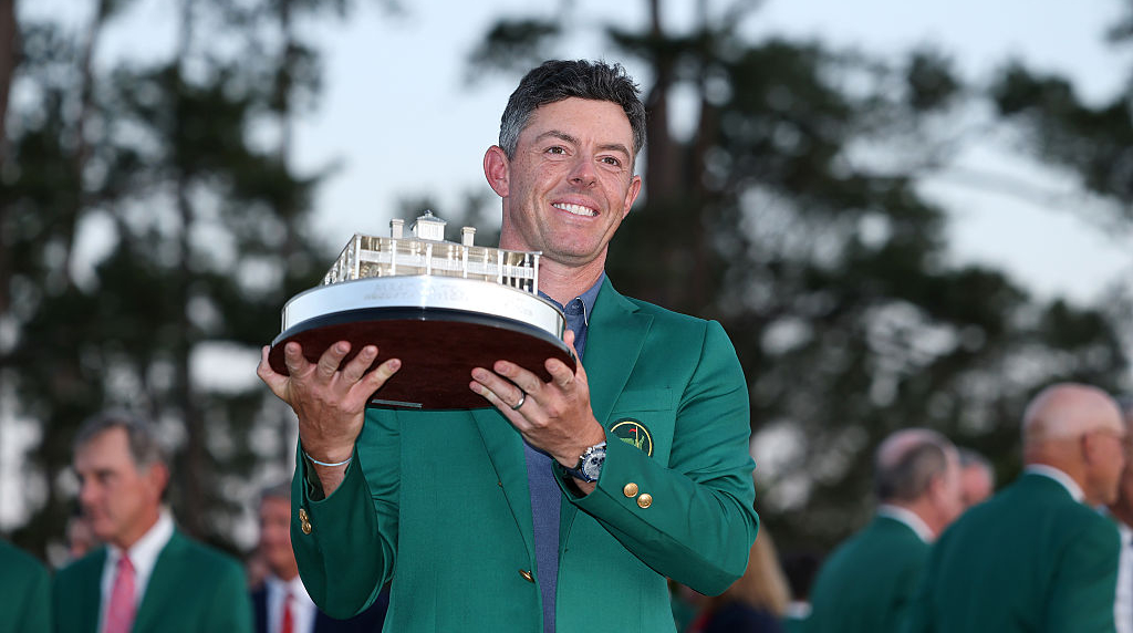 Rory McIlroy Poses with the Masters Trophy During the Green Jacket Ceremony