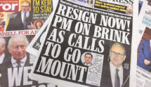 A Daily Express newspaper cover shows Sir Keir Starmer with a headline stating there is calls for his resignation.
