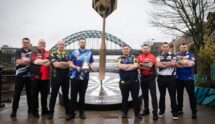 The Eight Players Contesting Darts' 2026 Premier League Pose in a Group Photo