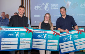 Winners Receive Charity Cheques at a PDC Europe Poker Fundraiser