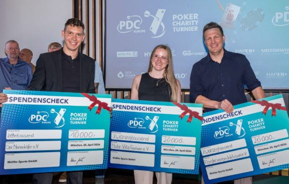 Winners Receive Charity Cheques at a PDC Europe Poker Fundraiser