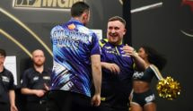 Luke littler at the oche.