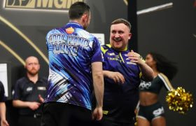 Luke littler at the oche.