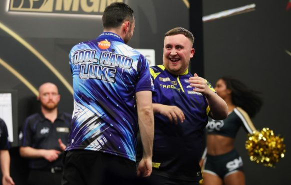 Luke littler at the oche.