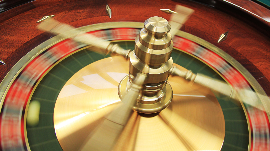 A Roulette Wheel in a Casino Spinning Around