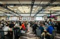 Players, Tables, Chips and Cards at the World Series of Poker.