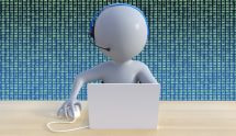 Customer support figure wearing a headset at a computer