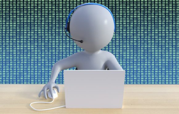 Customer support figure wearing a headset at a computer