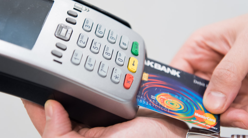 Debit card inserted into card reader