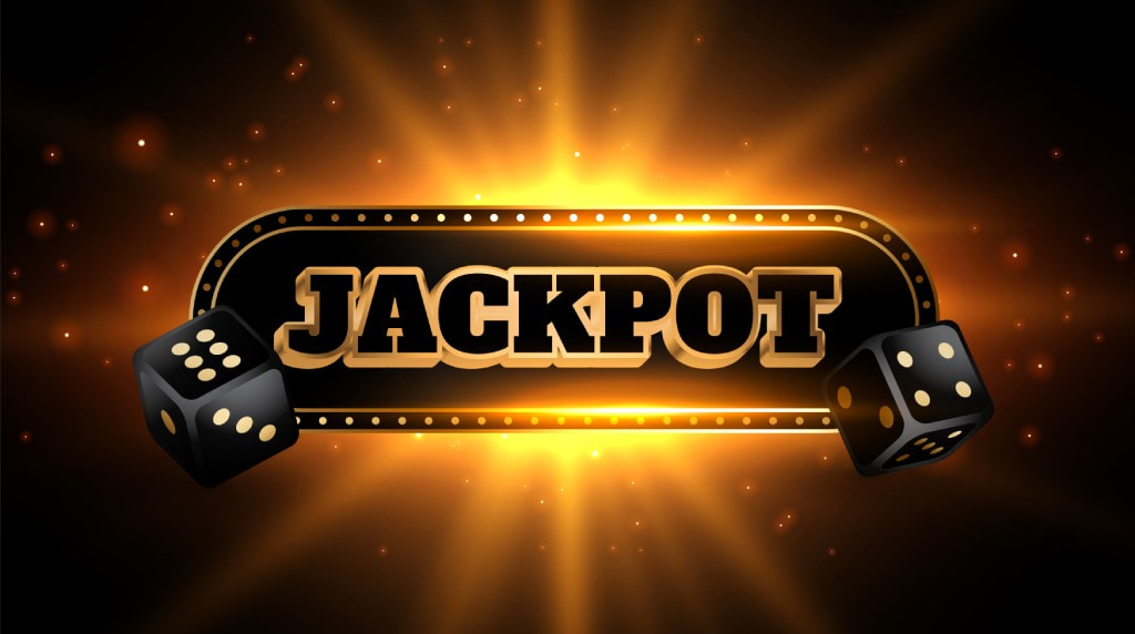Tekst “jackpot” met eromheen gouden effecten en zwarte dobbelstenen