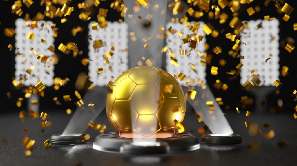 Gouden voetbal omgeven door gouden glitters
