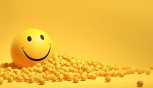 Grote smiley met heel veel kleine smileys (gele ballen)