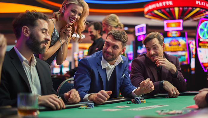 Formally dressed people at a casino table