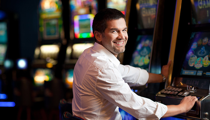 Person playing skill based slot