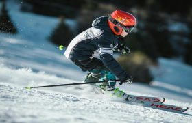 A person skiing down a slope